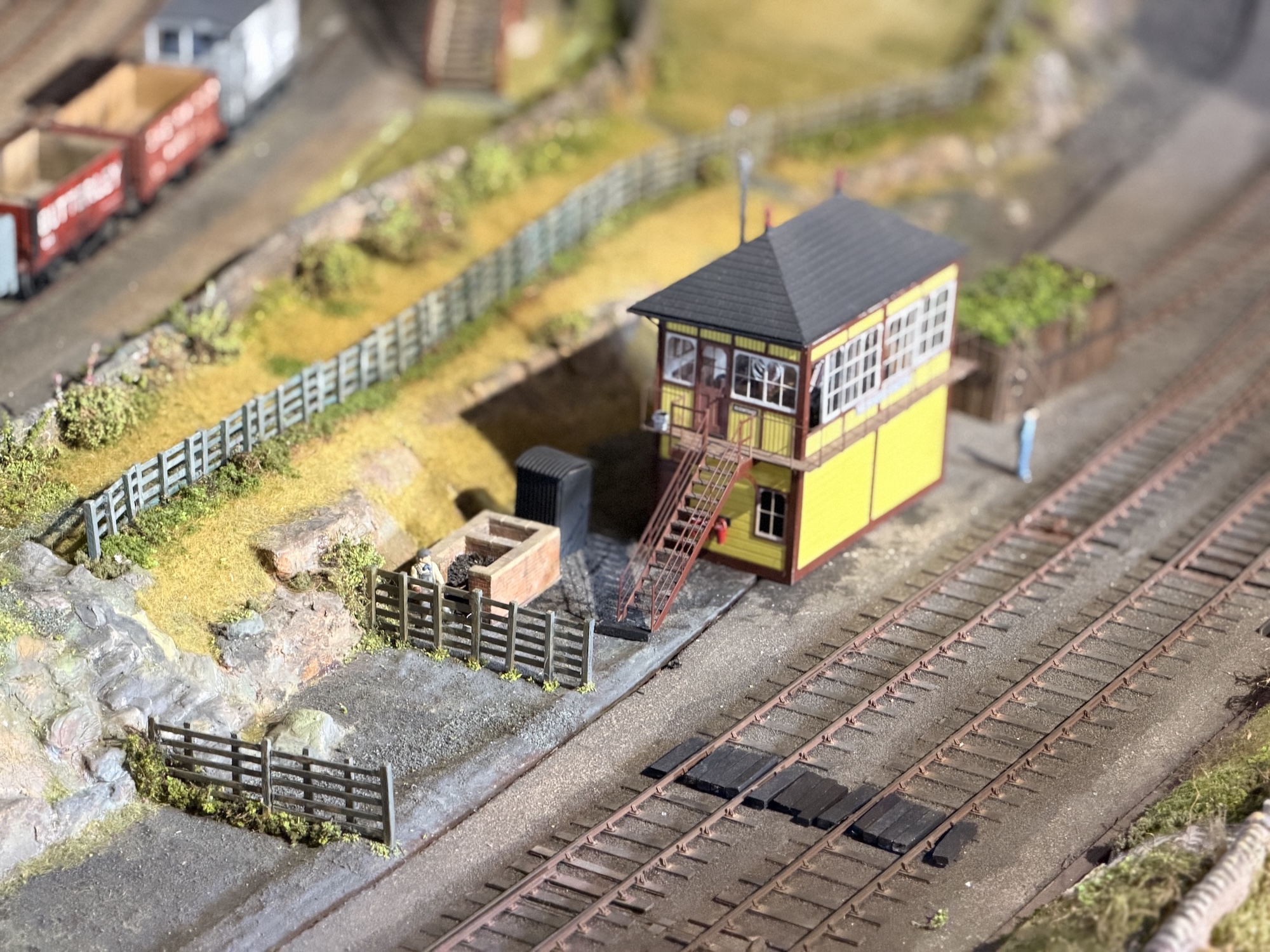 The newly installed Midland Railway signal box, with its striking Lemon Chrome paint scheme, on the 7mm to the foot scale model railway in the Museum of Making in the Silk Mill at Derby.