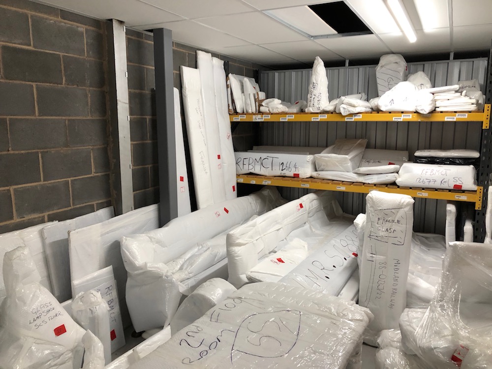 A glimpse behind the scenes of our objects in Deep Store. Many objects in a store room, all wrapped in protective white plastic