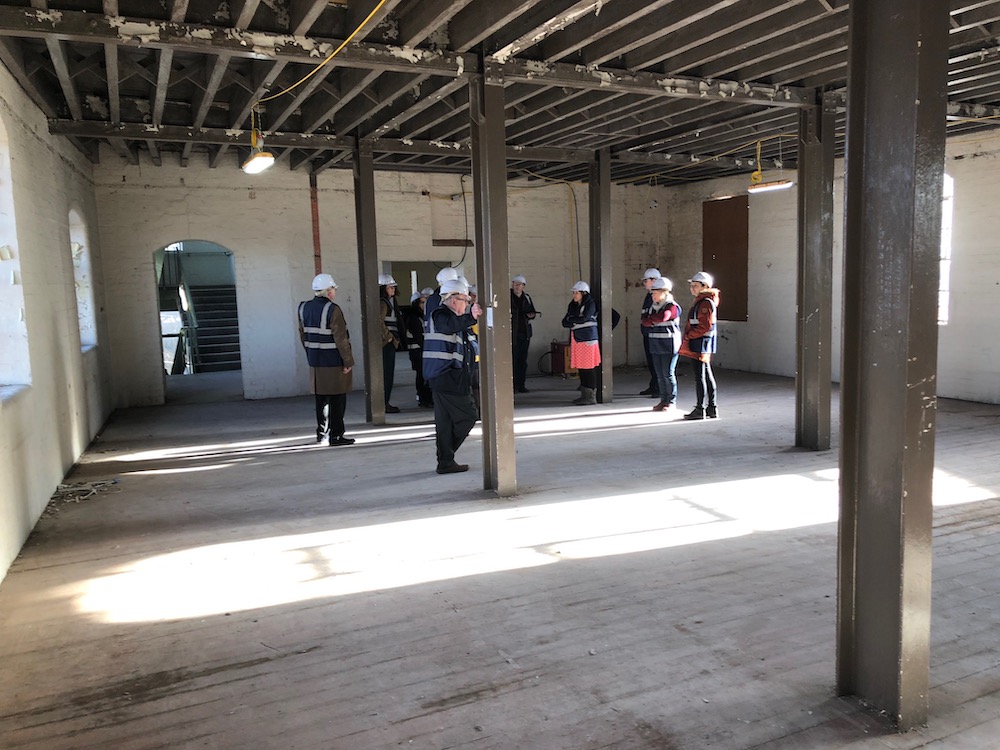  Steve Huson and David Geldard examining the future main entrance to the Midland Railway Study Centre inside the Silk Mill during the refurbishment in 2019