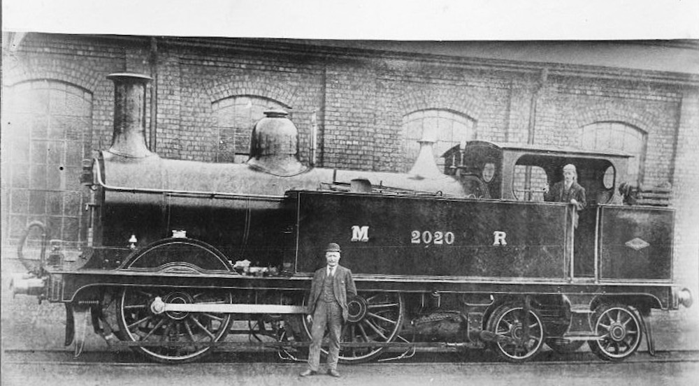 A photograph of Midland Railway locomotive No.2020, an 0-4-4 tank engine, displaying two of these brass numerals on its side.