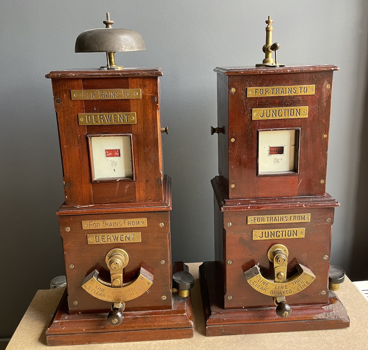The same two instruments now standing off the shelf and the plates on the other one resds Junction instead of Derwent. Each has a handle at the bottom which can be places to one of three positions; Line Clear, Line Blocked or Train on Line.