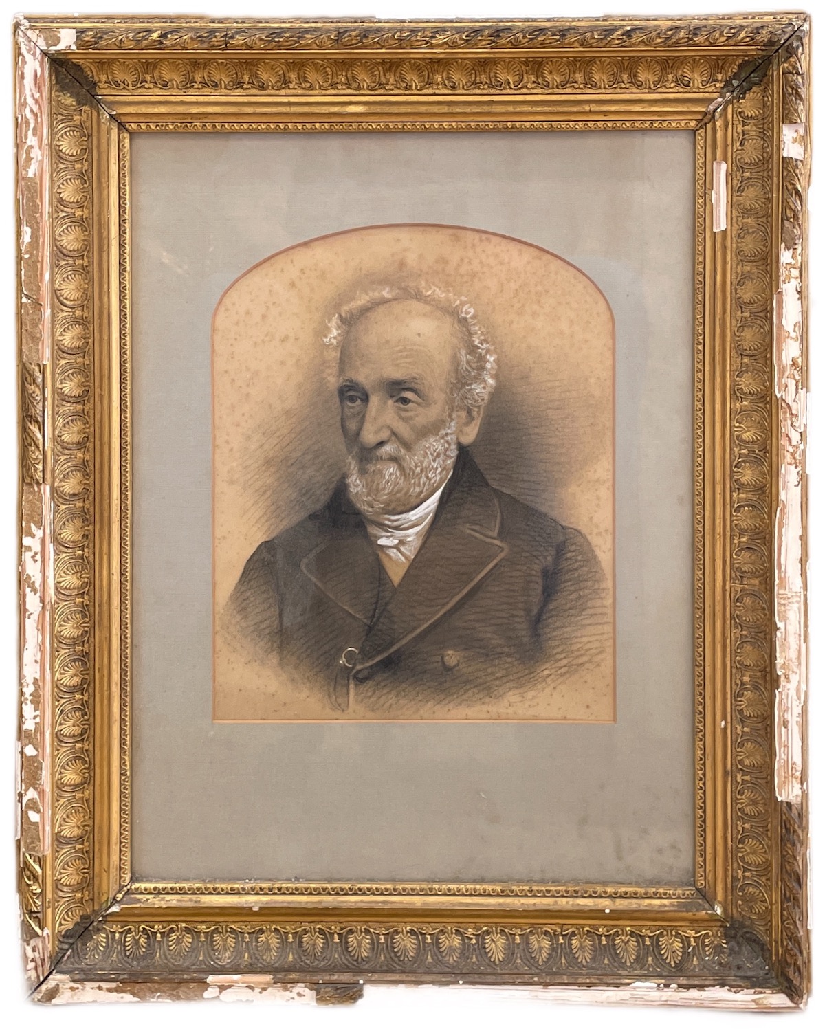 A charcoal or pastel style portrait of an elderly gentleman with white receeding hair and a white beard, gazing off to his right. He is Samuel Waite Johnson. The gold gilt frame is chipped and worn by time.