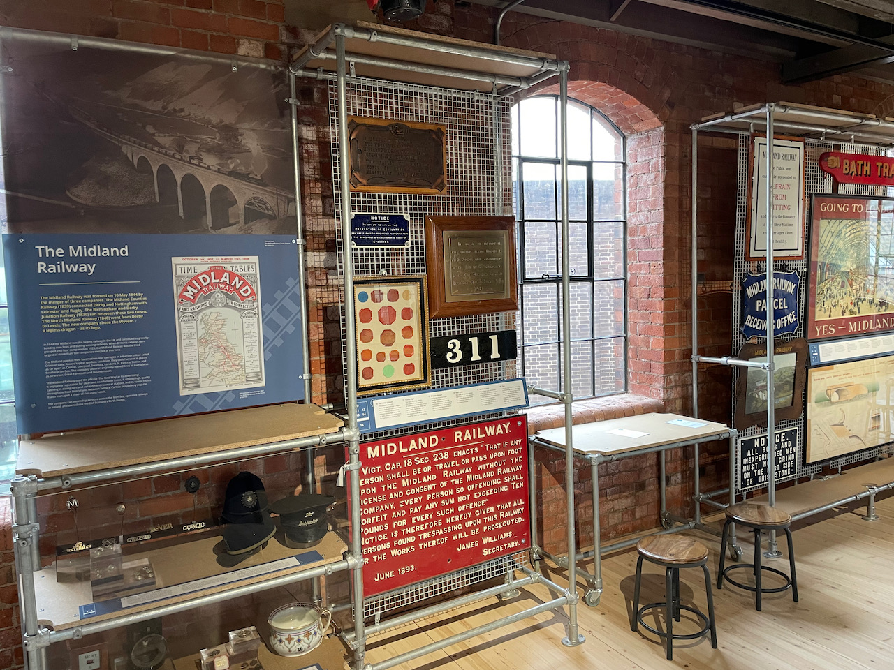 A view of the displays in the Railways Revealed gallery of the Museum of Mking in  Derby's Silk Mill. The plaque to Newton Hibbert is on prominent display